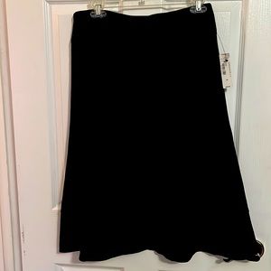 Black Skirt with flowers on the skirt tail.  Brand New, Never worn.